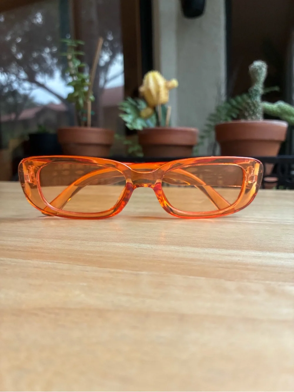 Vintage-Inspired Translucent Orange Rectangular Sunglasses